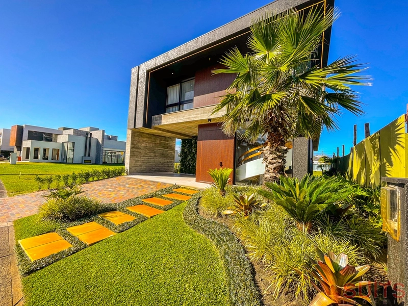 Lindíssimo sobrado  beira lago no condomínio Capão Ilhas Resort: 1ª foto da galeria de imagens do imóvel