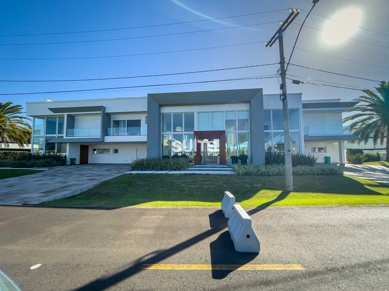 Mansão com 03 terrenos no condomínio Enseada: 2ª foto da galeria de imagens do imóvel