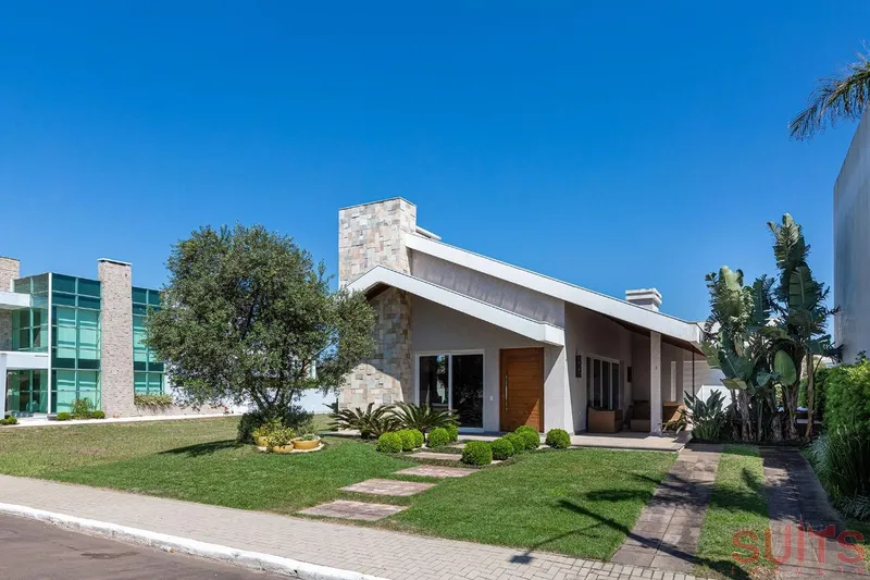 Excelente Casa Térrea no Condomínio Velas da Marina em Capão da Canoa: 1ª foto da galeria de imagens do imóvel