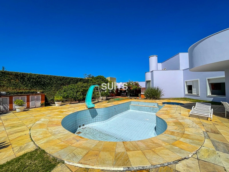 Excelente casa 02 terrenos proxíma do mar na praia de Atlântida: 1ª foto da galeria de imagens do imóvel