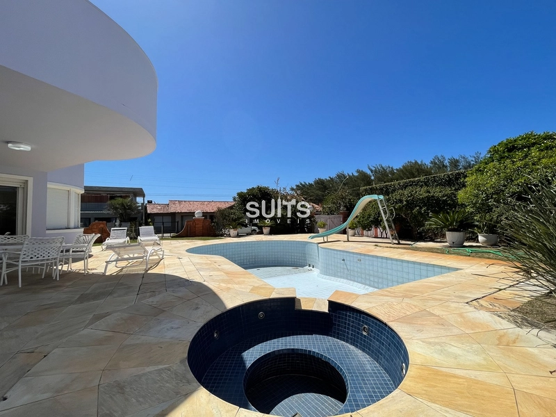 Excelente casa 02 terrenos proxíma do mar na praia de Atlântida: 2ª foto da galeria de imagens do imóvel