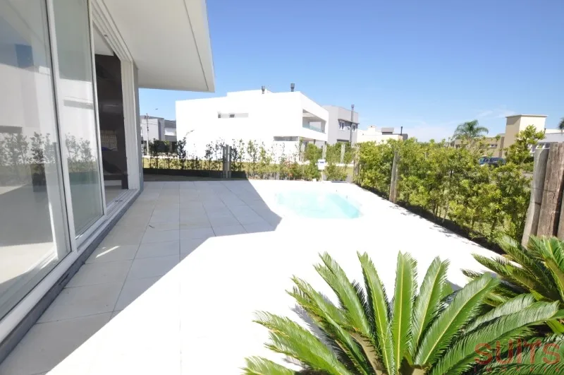 Espetacular Casa Térrea no Condomínio Sea Coast.: 1ª foto da galeria de imagens do imóvel