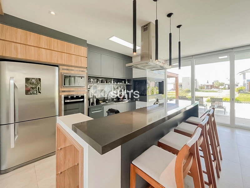 Excelente casa beira lago no condomínio Riviera: 6ª foto da galeria de imagens do imóvel