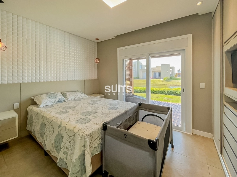 Excelente casa beira lago no condomínio Riviera: 15ª foto da galeria de imagens do imóvel