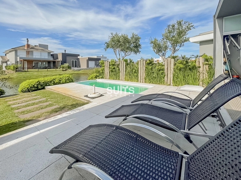 Excelente casa beira lago no condomínio Riviera: 12ª foto da galeria de imagens do imóvel