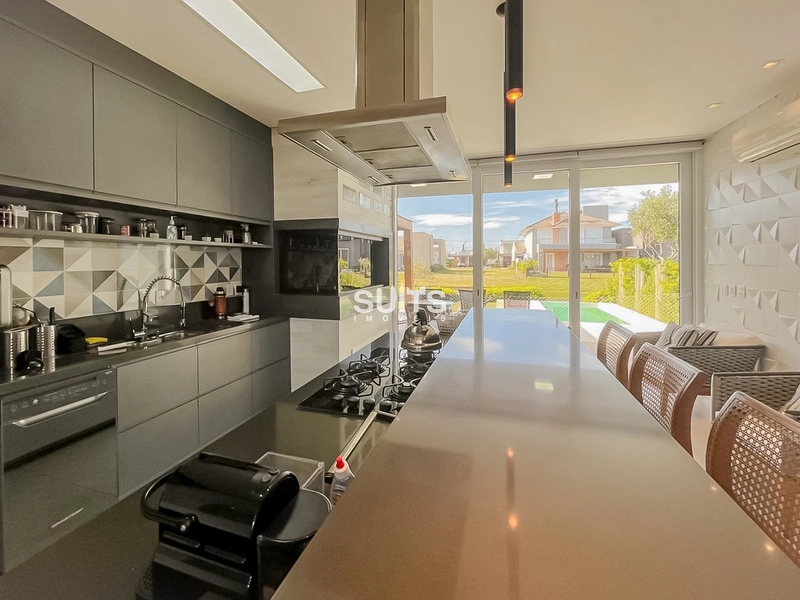 Excelente casa beira lago no condomínio Riviera: 7ª foto da galeria de imagens do imóvel