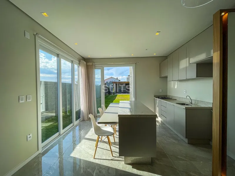 Excelente sobrado novo próximo ao mar no Centro de Xangri-Lá: 8ª foto da galeria de imagens do imóvel