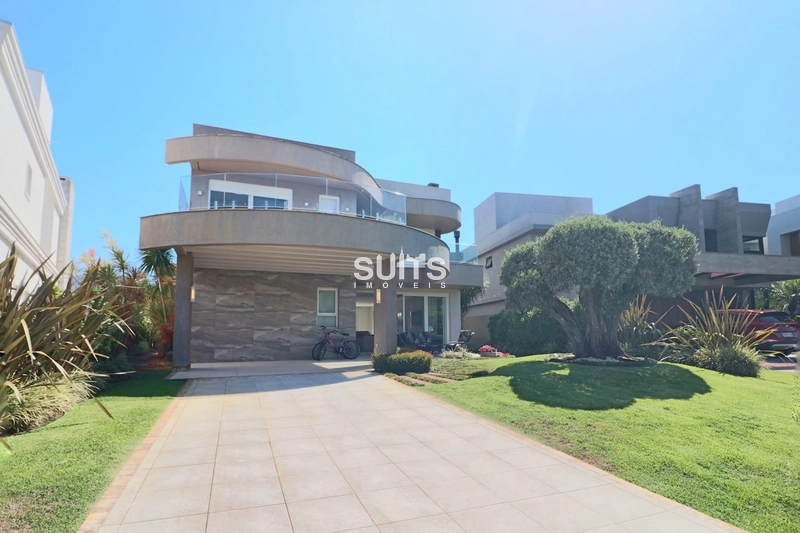 Sobrado na beira do lago no condomínio Enseada: 2ª foto da galeria de imagens do imóvel