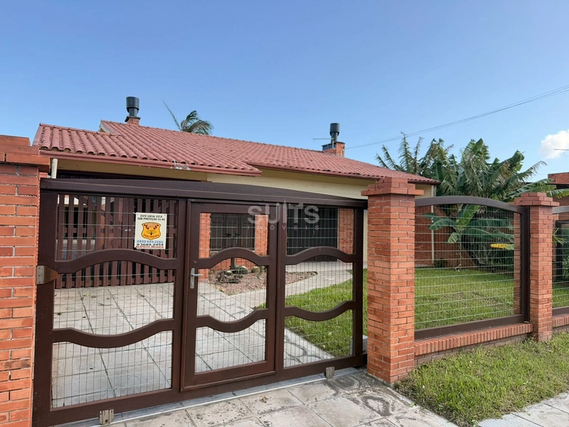 Excelente casa à venda no Centro de Xangri-Lá : 3ª foto da galeria de imagens do imóvel