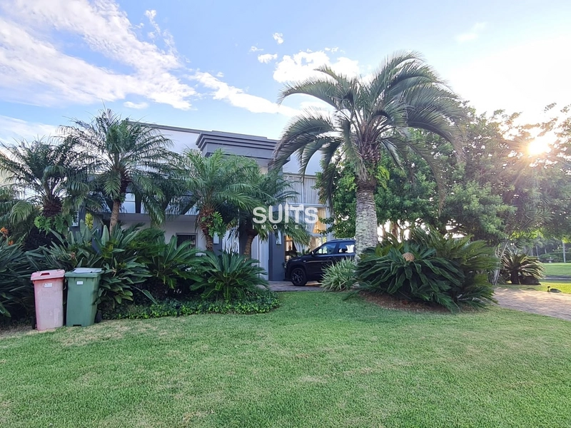 Excelente Sobrado no Condomínio Bosques de Atlântida: 2ª foto da galeria de imagens do imóvel