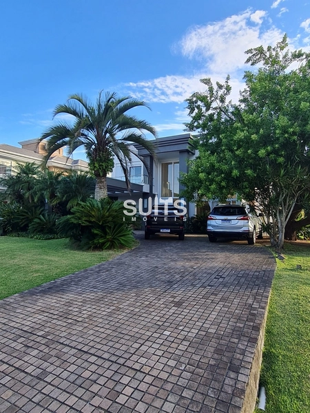 Excelente Sobrado no Condomínio Bosques de Atlântida: 3ª foto da galeria de imagens do imóvel