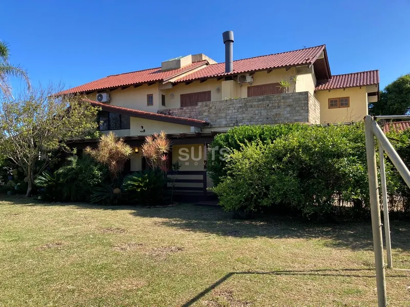 Excelente sobrado com 02 terrenos em Atlântida: 39ª foto da galeria de imagens do imóvel