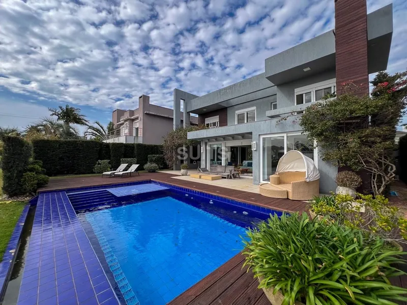 Excelente casa à venda no condomínio Bosques de Atlântida: 35ª foto da galeria de imagens do imóvel