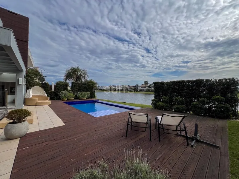 Excelente casa à venda no condomínio Bosques de Atlântida: 37ª foto da galeria de imagens do imóvel