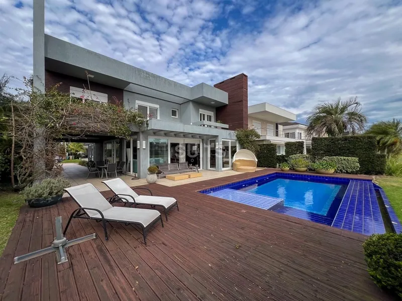 Excelente casa à venda no condomínio Bosques de Atlântida: 36ª foto da galeria de imagens do imóvel