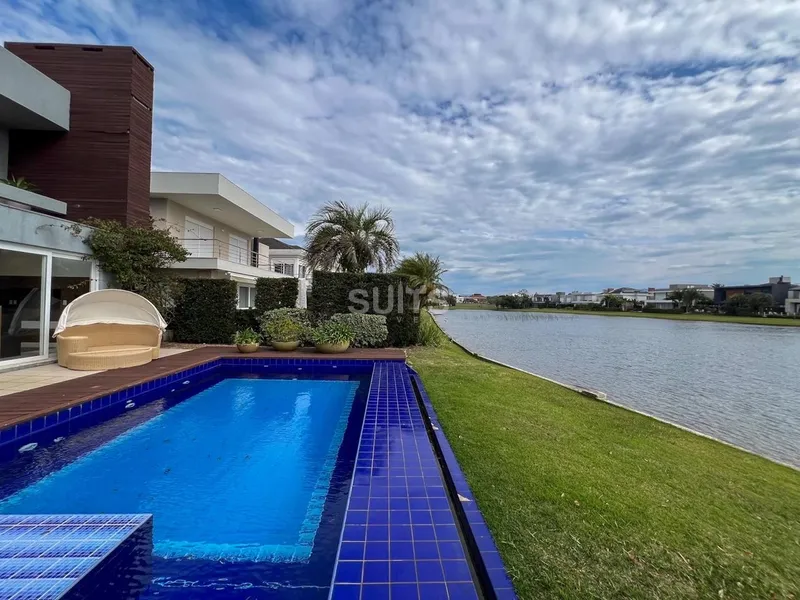 Excelente casa à venda no condomínio Bosques de Atlântida: 34ª foto da galeria de imagens do imóvel