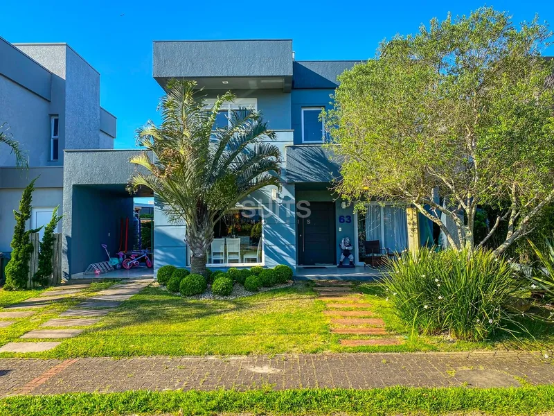 Ótimo sobrado em excelente localização no condomínio Sea Coast: 1ª foto da galeria de imagens do imóvel