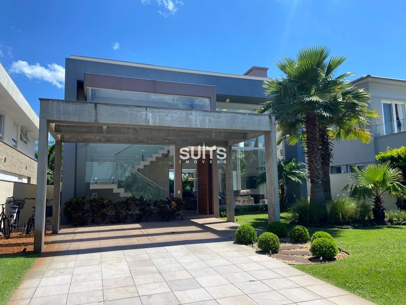 Excelente sobrado à venda no condomínio Bosques em Atlântida: 3ª foto da galeria de imagens do imóvel