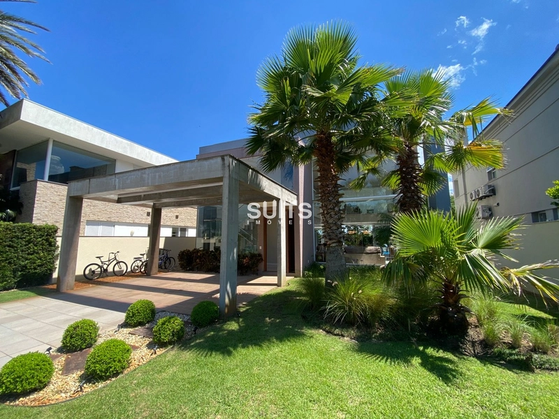 Excelente sobrado à venda no condomínio Bosques em Atlântida: 2ª foto da galeria de imagens do imóvel