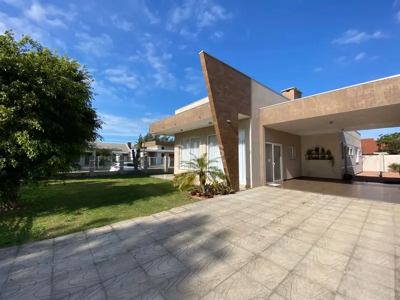 Excelente casa de esquina na praia de Atlântida: 3ª foto da galeria de imagens do imóvel