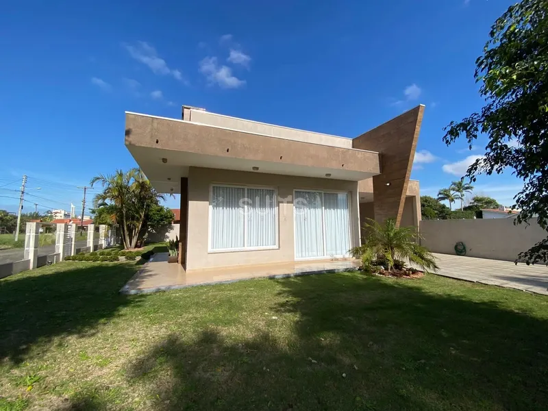 Excelente casa de esquina na praia de Atlântida: 4ª foto da galeria de imagens do imóvel