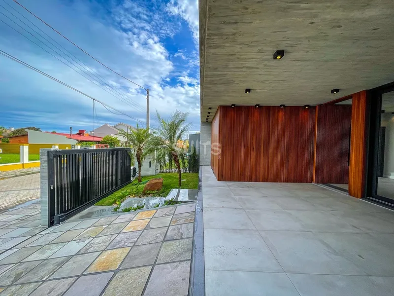 Uma das melhores casas à poucos metros do mar no Centro de Xangri-Lá: 3ª foto da galeria de imagens do imóvel