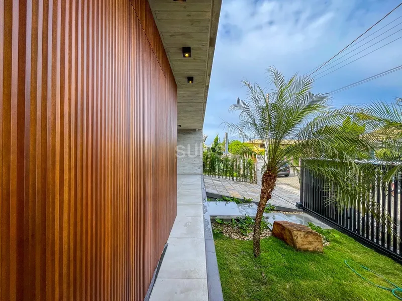 Uma das melhores casas à poucos metros do mar no Centro de Xangri-Lá: 5ª foto da galeria de imagens do imóvel