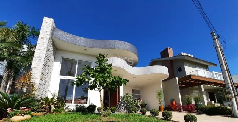 Excelente casa próxima ao clube no condomínio Las Palmas em Xangri-Lá: 3ª foto da galeria de imagens do imóvel