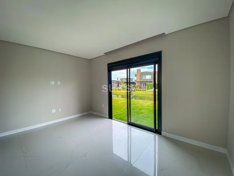 Excelente Casa terréa beira lago no condomínio Riviera: 15ª foto da galeria de imagens do imóvel