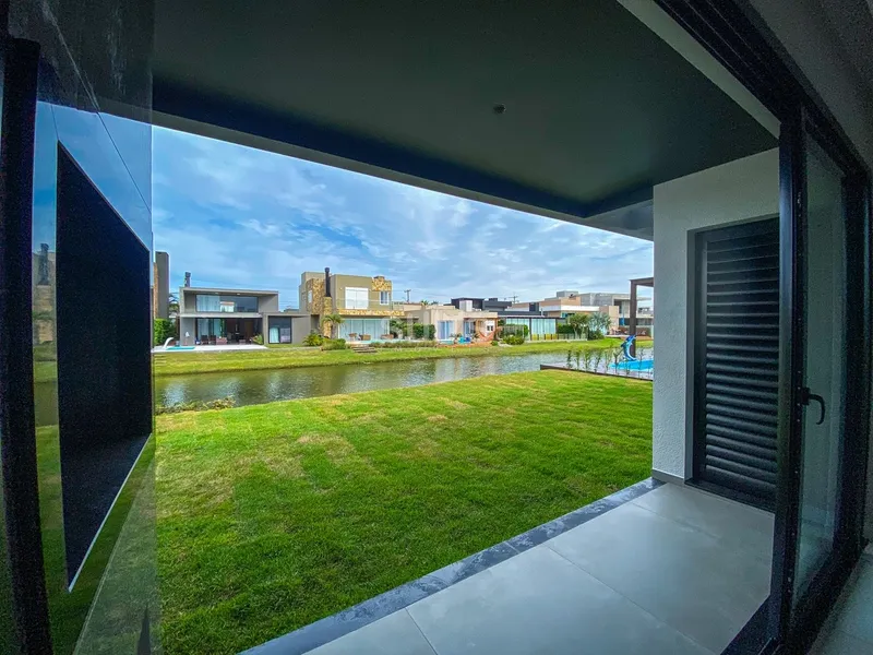 Excelente Casa terréa beira lago no condomínio Riviera: 9ª foto da galeria de imagens do imóvel