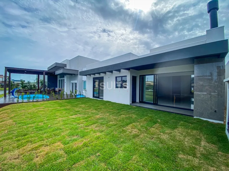 Excelente Casa terréa beira lago no condomínio Riviera: 12ª foto da galeria de imagens do imóvel