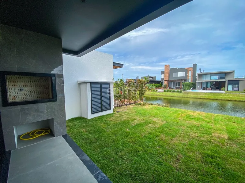 Excelente Casa terréa beira lago no condomínio Riviera: 10ª foto da galeria de imagens do imóvel