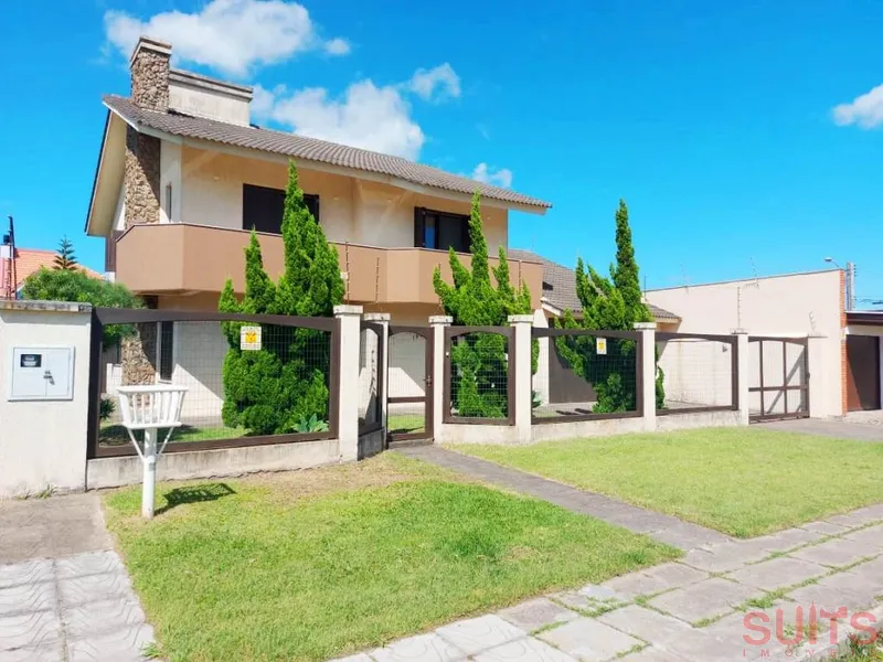 Excelente sobrado na avenida principal do Centro de Xangri-Lá: 1ª foto da galeria de imagens do imóvel