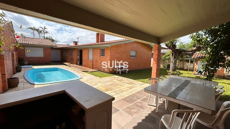 Casa térrea na praia de Atlântida, a poucos metros do mar!: 26ª foto da galeria de imagens do imóvel