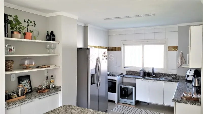 Excelente sobrado à poucos metros do mar no Centro de Xangri-Lá: 9ª foto da galeria de imagens do imóvel