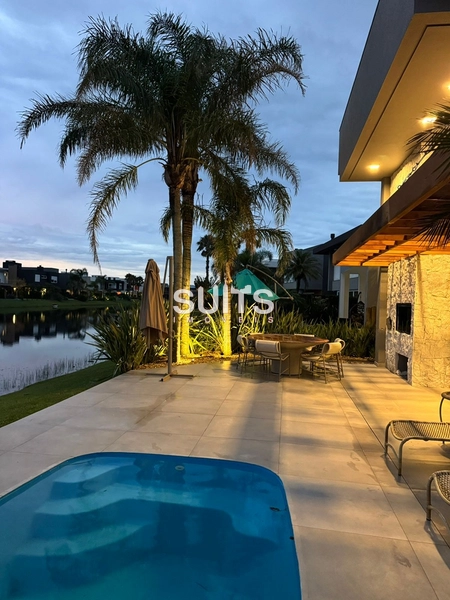 EXCELENTE CASA TERREA BEIRA LAGO CONDOMINIO ENSEADA: 13ª foto da galeria de imagens do imóvel