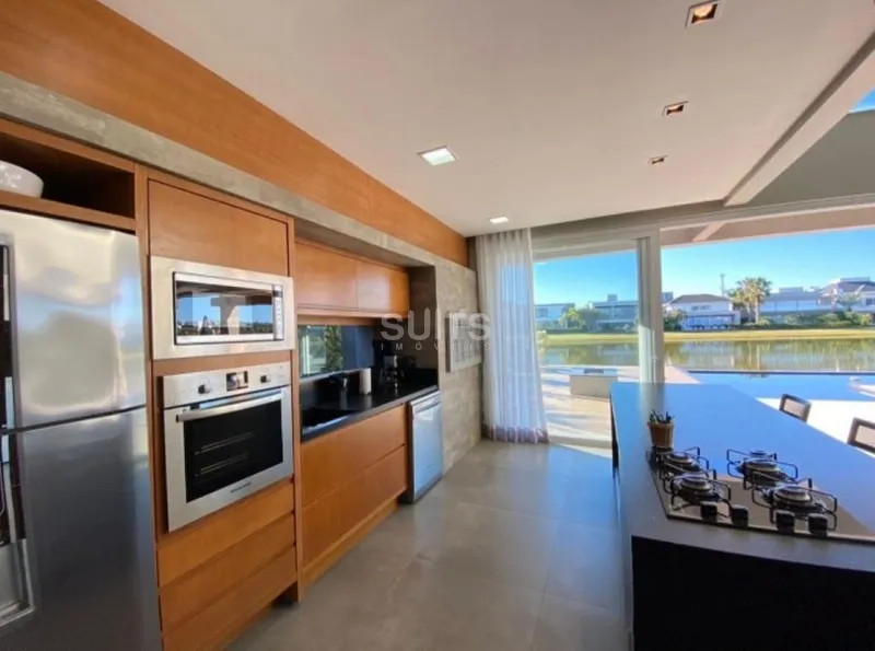 Excelente sobrado nas margens do lago no cond. Bosques de Atlântida: 13ª foto da galeria de imagens do imóvel