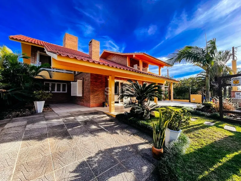 Excelente sobrado a poucos metros do mar no Centro de Xangri-Lá: 4ª foto da galeria de imagens do imóvel