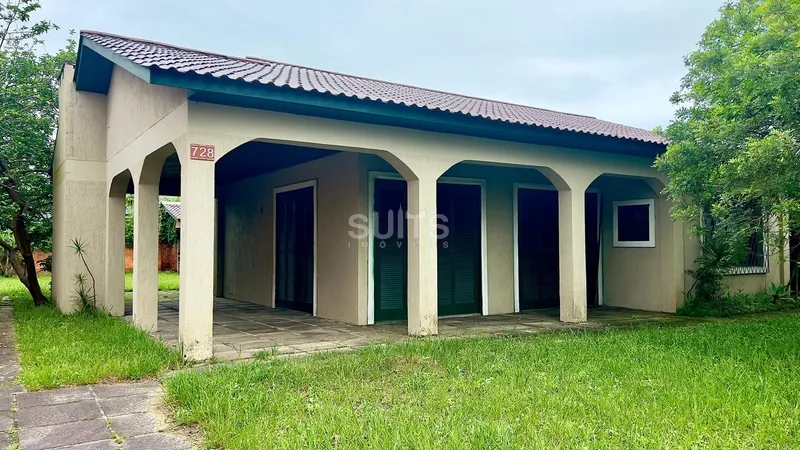 Ótima casa com amplo pátio na praia de Atlântida: 2ª foto da galeria de imagens do imóvel