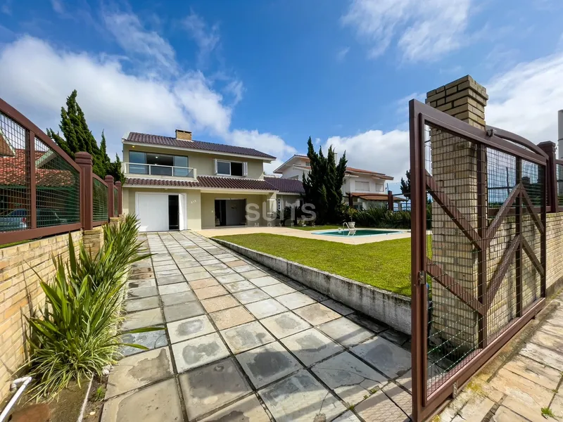 Excelente sobrado à 01 quadra do mar na praia de Remanso em Xangri-Lá: 1ª foto da galeria de imagens do imóvel