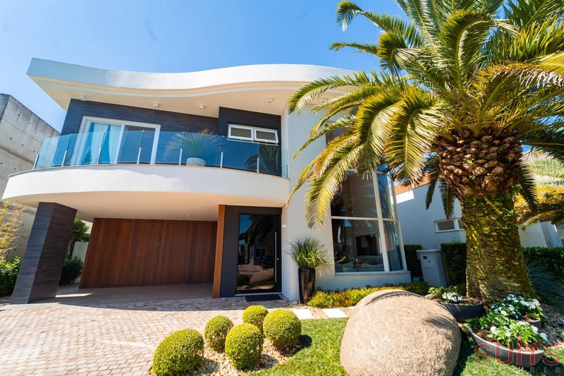 Excelente sobrado beira lago no condomínio Enseada: 2ª foto da galeria de imagens do imóvel