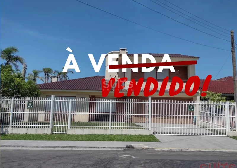 Excelente sobrado próximo ao mar no centro de Xangri-Lá: 1ª foto da galeria de imagens do imóvel