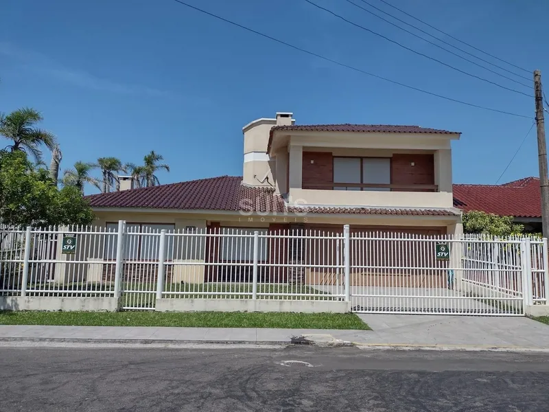 Excelente sobrado próximo ao mar no centro de Xangri-Lá: 2ª foto da galeria de imagens do imóvel