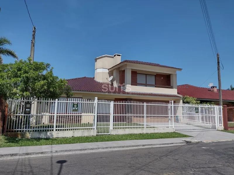 Excelente sobrado próximo ao mar no centro de Xangri-Lá: 3ª foto da galeria de imagens do imóvel