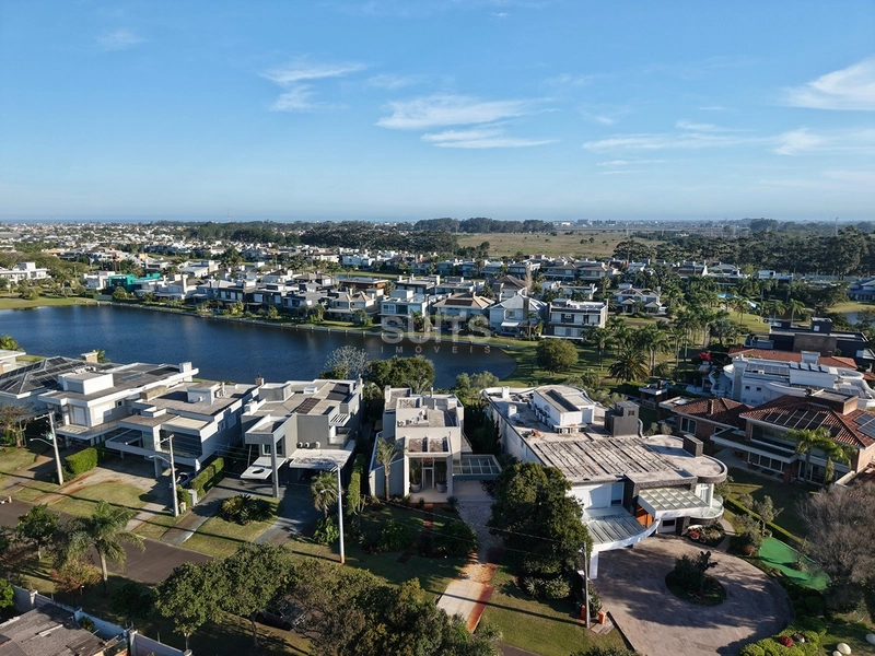 Lindo Sobrado beira lago no Condomínio Bosques de Atlântida: 41ª foto da galeria de imagens do imóvel