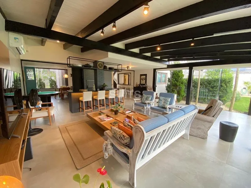 Belíssimo sobrado em Atlântida na região do Caburé: 6ª foto da galeria de imagens do imóvel