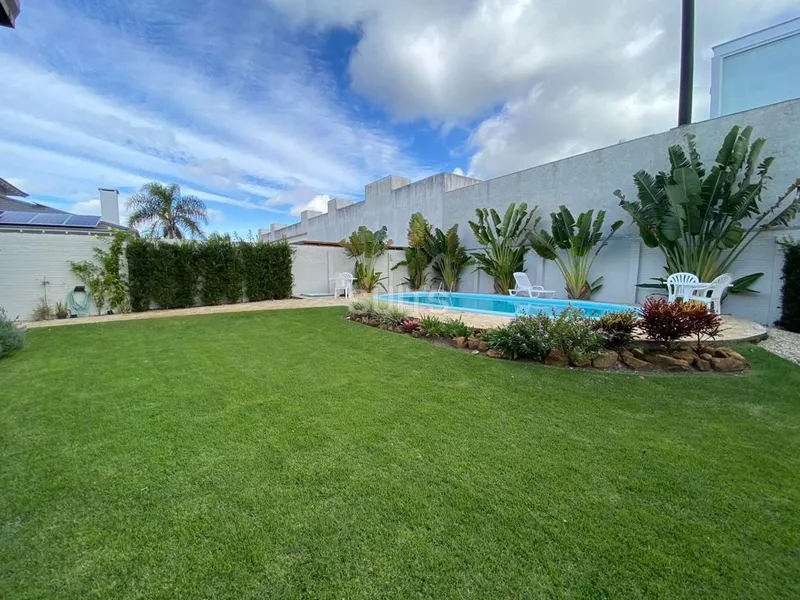 Belíssimo sobrado em Atlântida na região do Caburé: 4ª foto da galeria de imagens do imóvel