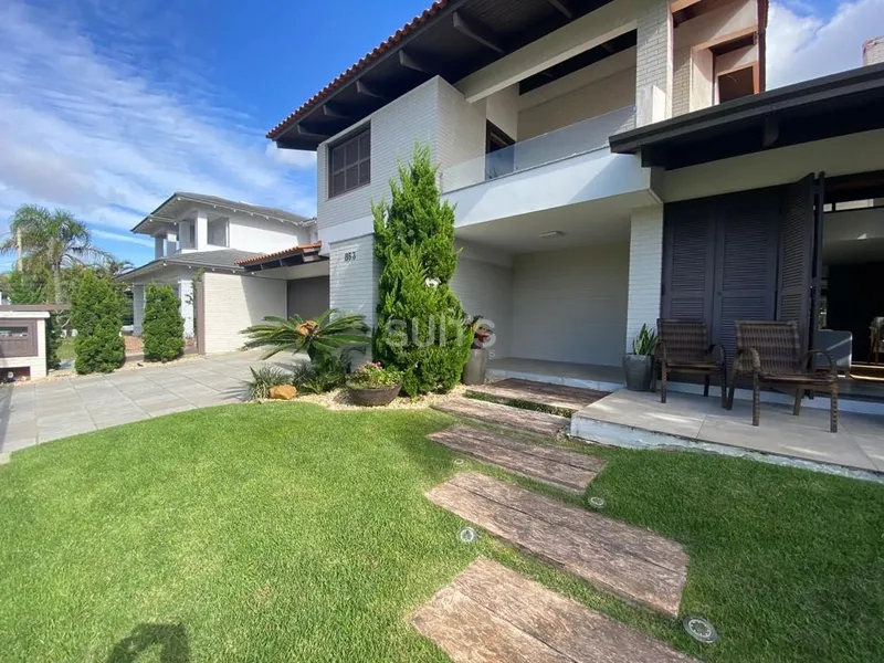 Belíssimo sobrado em Atlântida na região do Caburé: 27ª foto da galeria de imagens do imóvel