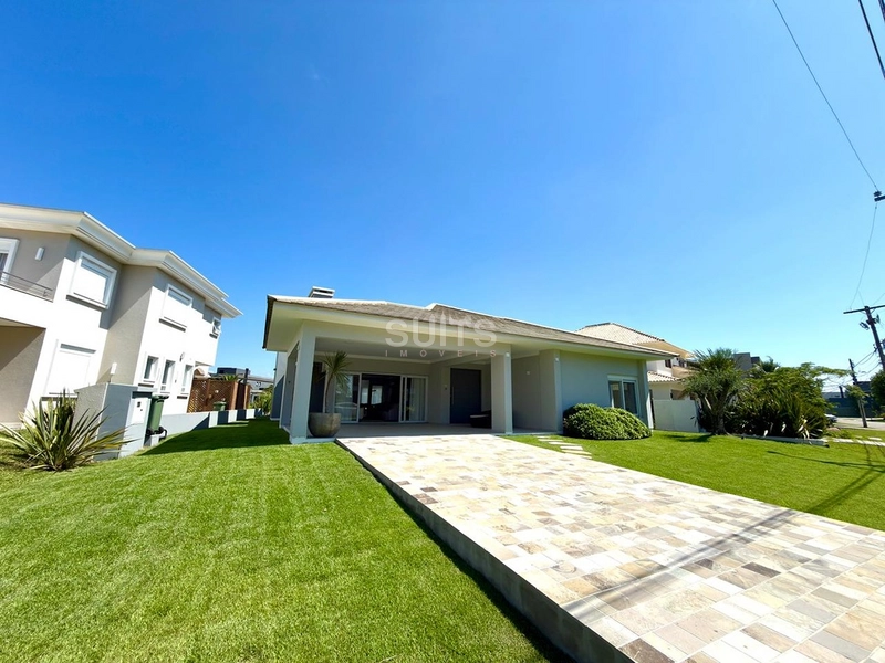 Excelente casa com fundos para área verde no condomínio Ventura: 1ª foto da galeria de imagens do imóvel