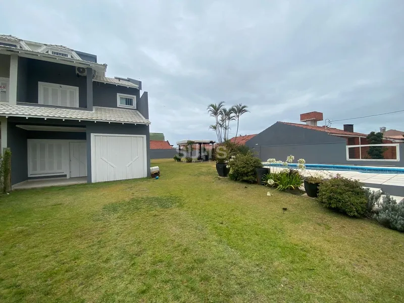 Excelente triplex à venda no Centro de Xangri-Lá: 2ª foto da galeria de imagens do imóvel